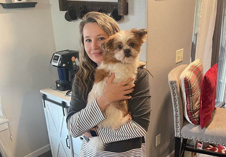 Lisa Pioneer Veterinary Hospital Receptionist and her dog
